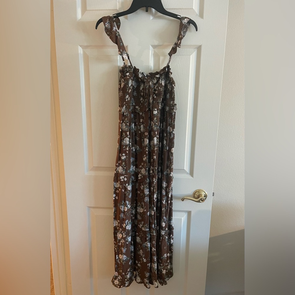 Maxi brown with flowers size medium with adjustable straps dress.